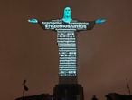 Messages of support in different languages are projected on the statue of the Christ Redemeer atop Corcovado hill in Rio de Janeiro, Brazil, on March 18, 2020. - Two cabinet ministers and the head of the Brazilian Senate said Wednesday they had tested positive for new coronavirus, COVID-19, but President Jair Bolsonaro again warned against what he called "hysteria" surrounding the pandemic. (Photo by FLORIAN PLANCHEUR / AFP)