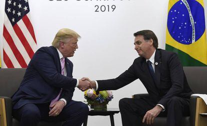 Os presidentes Trump e Bolsonaro, durante encontro na cúpula do G20 nesta sexta.