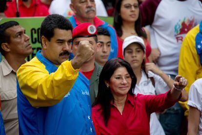 Nicol&aacute;s Maduro e Cilia Flores em um evento em Caracas. 