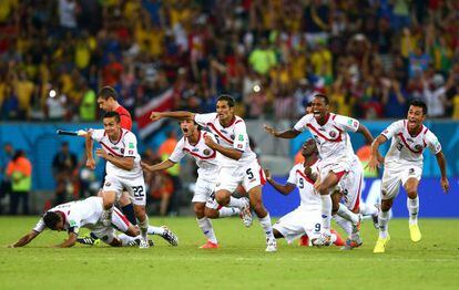 Os jogadores da Costa Rica celebram a classificação