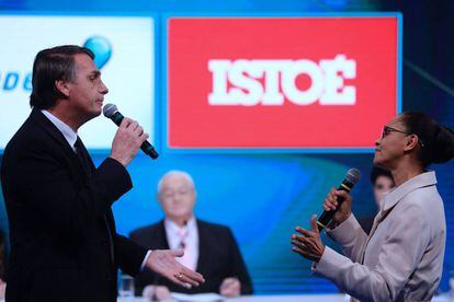 Jair Bolsonaro e Marina Silva durante o debate.