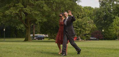 Barack Obama junto a sua esposa Michelle, nesta segunda-feira em Washington.