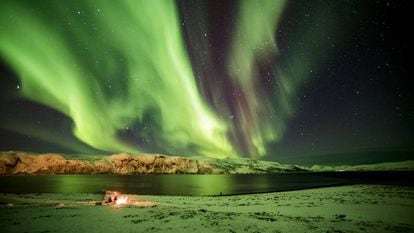 Aurora boreal em Myre, na província norueguesa de Troms, dentro do Círculo Polar Ártico.