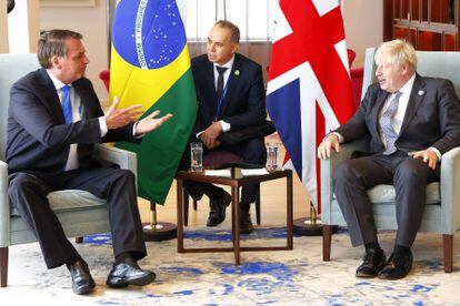 O presidente Jair Bolsonaro e o primeiro-ministro britânico, Boris Johnson, conversam durante encontro em Nova York, às vésperas da abertura da Assembleia Geral da ONU.