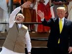 U.S. President Donald Trump and Indian Prime Minister Narendra Modi wave to the crowd at Sardar Patel Stadium in Ahmedabad, India, Monday, Feb. 24, 2020. India poured on the pageantry with a joyful, colorful welcome for President Donald Trump on Monday that kicked off a whirlwind 36-hour visit meant to reaffirm U.S.-India ties while providing enviable overseas imagery for a president in a re-election year. (AP Photo/Aijaz Rahi)