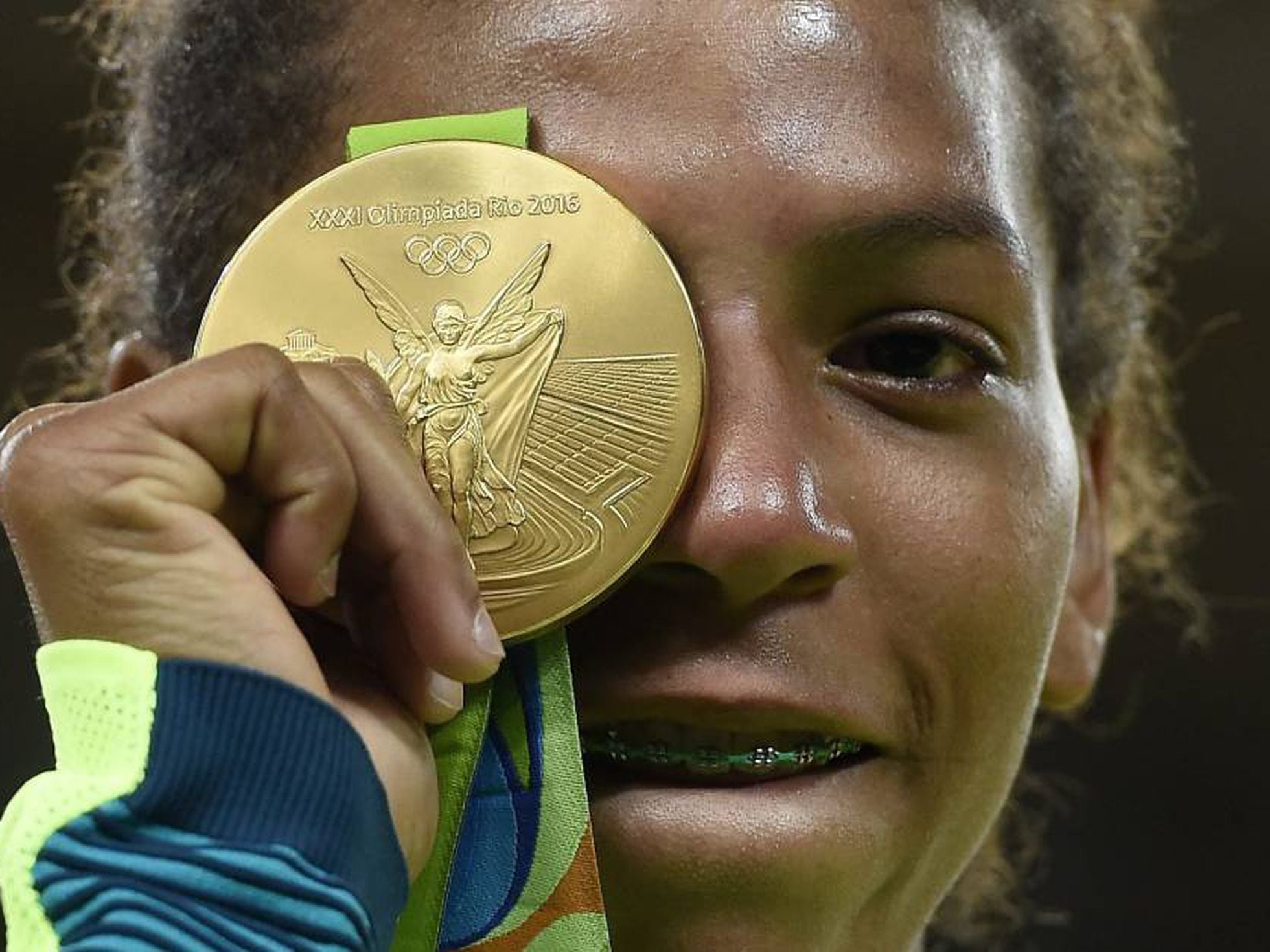 Rafaela Silva: Negra, pobre e Silva: o primeiro ouro da Rio 2016 é a cara  do Brasil, Esportes