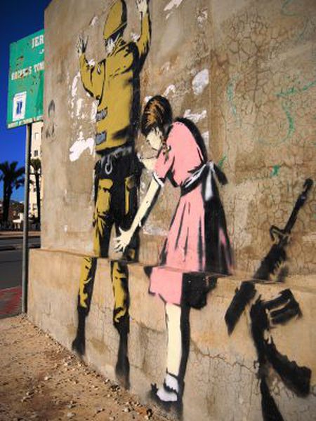 Obra do artista britânico Banksy na Cisjordânia.