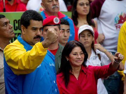Nicol&aacute;s Maduro e Cilia Flores em um evento em Caracas. 