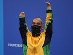 Tokyo 2020 Paralympic Games - Men's 200m Freestyle - S5 Medal Ceremony – Tokyo Aquatics Centre, Tokyo, Japan - August 25, 2021. Bronze medalist, Daniel De Faria Dias of Brazil, celebrates on the podium REUTERS/Molly Darlington