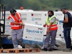 A shipment of doses of the Sputnik V (Gam-COVID-Vac) vaccine against the coronavirus disease (COVID-19) is transported after arriving at the Ezeiza International Airport, in Buenos Aires, Argentina January 28, 2021. REUTERS/Agustin Marcarian