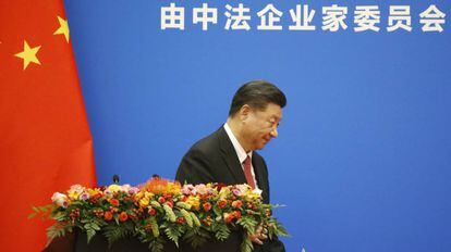 O presidente chinês Xi, depois de sua intervenção em um foro entre França e Chinesa, na quarta-feira em Pequim.