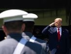 WEST POINT, NY - JUNE 13: U.S. President Donald Trump salutes cadets at the beginning of the commencement ceremony on June 13, 2020 in West Point, New York. The graduating cadets were sent home in March due to the COVID-19 pandemic, but have been ordered back to attend the commencement after the president announced he would continue with the previously planned address.   David Dee Delgado/Getty Images/AFP
== FOR NEWSPAPERS, INTERNET, TELCOS & TELEVISION USE ONLY ==