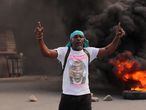 Un hombre con una camiseta con el rostro del asesinado presidente Jovenel Moise durante una jornada de protestas en Cap-Haitien el jueves.