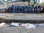 People wait in line to vote at a polling station in the Complexo do Alemao slum during the municipal elections in Rio de Janeiro, Brazil, November 15, 2020. REUTERS/Ricardo Moraes