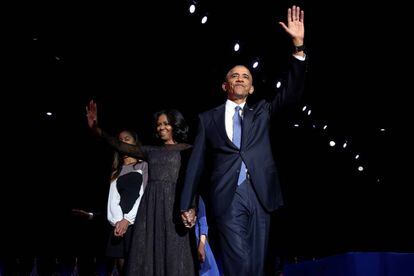 Obama junto a sua esposa Michelle e sua filha Malia.