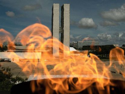 O Congresso Nacional, em Brasília, fotografado através ao fundo da chama do Panteão da Pátria.