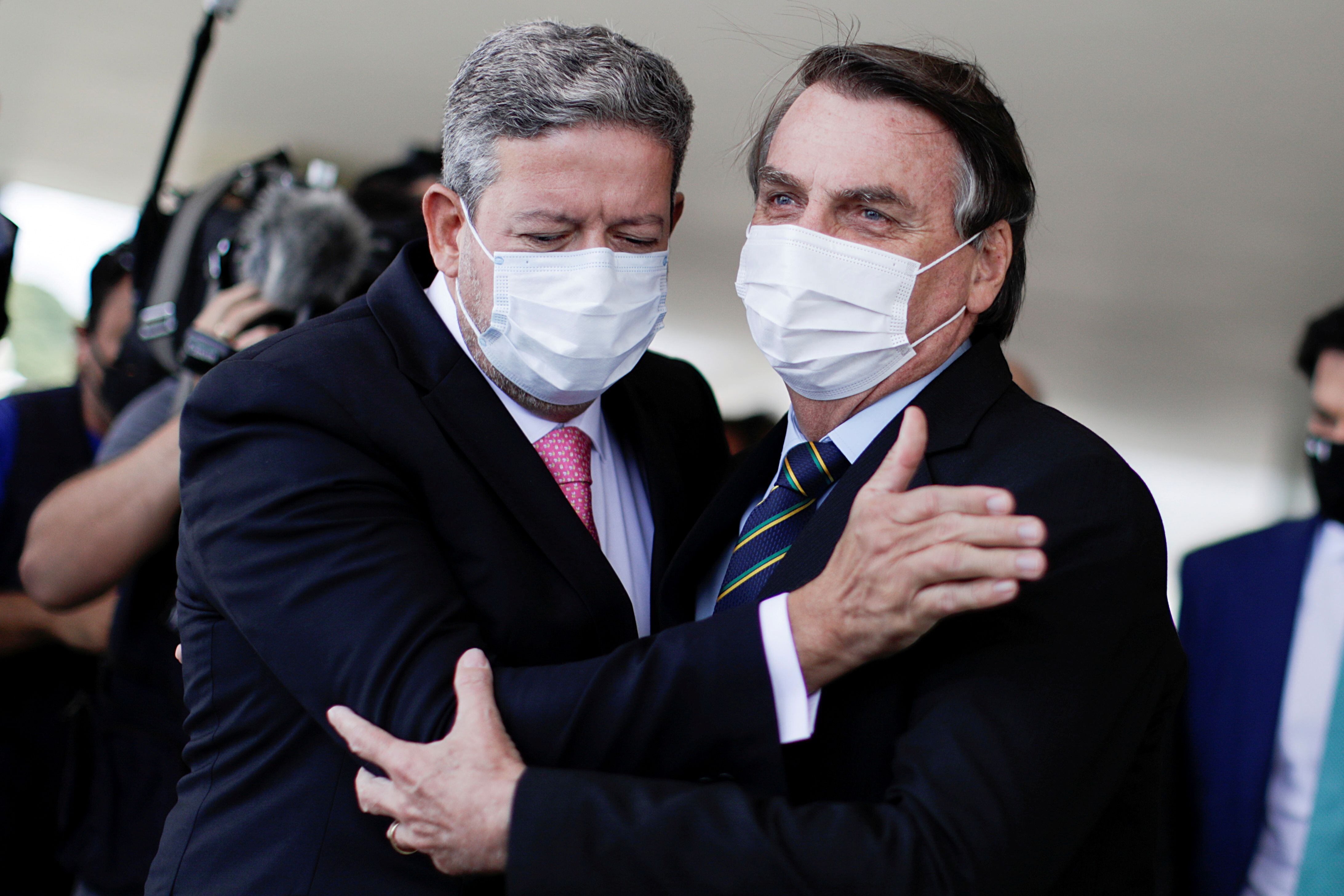 O presidente da Câmara, Arthur Lira, e o presidente Jair Bolsonaro, em encontro em 25 de março no Palácio do Planalto. 