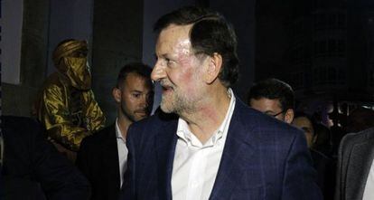 Rajoy, com rosto vermelho após receber o golpe.