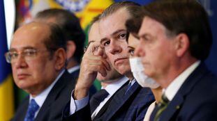 Os magistrados do STF Gilmar Mendes e Toffoli na posse de novos ministros de Bolsonaro (em primeiro plano).