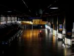 View of an almost empty hall at Guarulhos International Airport amid the outbreak of the coronavirus disease (COVID-19), in Guarulhos, near Sao Paulo, Brazil, on May 26, 2020. (Photo by Miguel SCHINCARIOL / AFP)