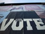 LOS ANGELES, CALIFORNIA - OCTOBER 03: A poster reads 'Vote' and includes a voter registration QR code below (NOT VISIBLE) on October 3, 2020 in Los Angeles, California. President Donald Trump and Democratic presidential nominee Joe Biden are on the ballot for the 2020 presidential elections on November 3.   Mario Tama/Getty Images/AFP
== FOR NEWSPAPERS, INTERNET, TELCOS & TELEVISION USE ONLY ==