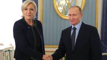 Marine Le Pen e Vladimir Putin em março, em Moscou.