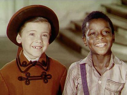 Bobby Driscoll (esquerda) e Glenn Leedy, em cena de 'A Canção do Sul' (1946).