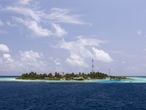 Rakkedhoo, um dos atóis das ilhas Maldivas, que poderiam desaparecer se o nível do mar continuar subindo.