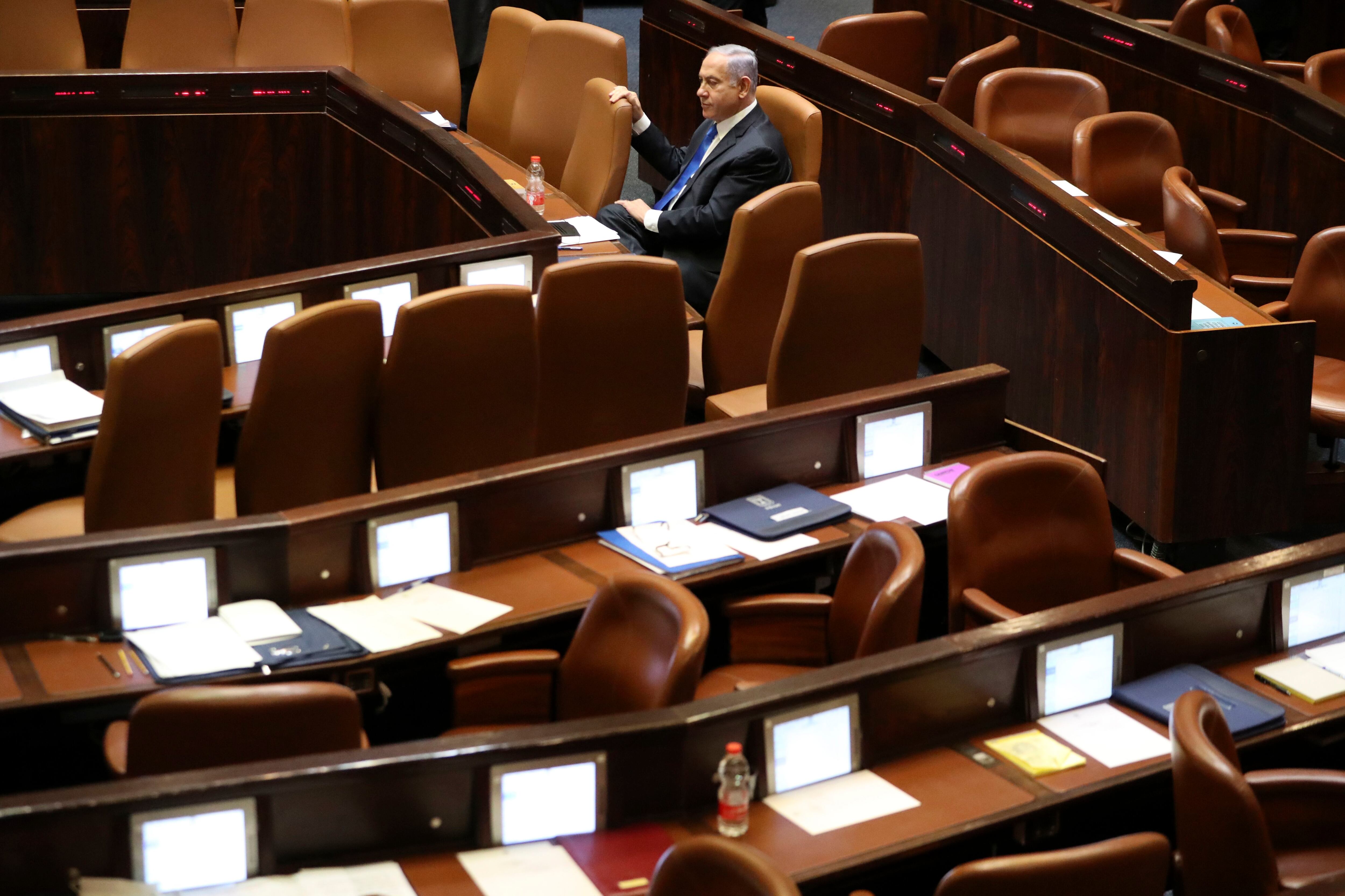 O primeiro-ministro em final de mandato de Israel, Benjamin Netanyahu, no Knesset (Parlamento), em Jerusalém em 13 de junho. 