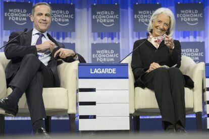 Mark Carney, do Banco da Inglaterra, e Christine Lagarde, do FMI, em Davos.