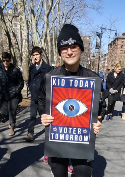 Tai, com 14 anos, na marcha de Nova York avisa que é um futuro votante