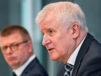 German Interior Minister Horst Seehofer speaks during a news conference with head of the German Federal Office for the Protection of the Constitution Thomas Haldenwang in Berlin, Germany June 15, 2021. Michael Sohn/Pool via REUTERS