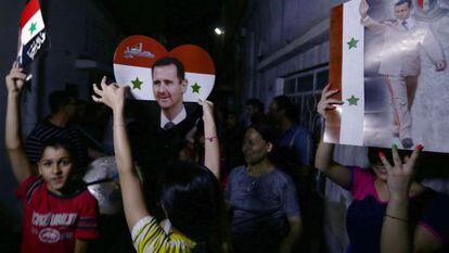 Comemoração em Damasco após a vitória de Assad.