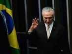 President Michel Temer waves as he takes office on Wednesday.