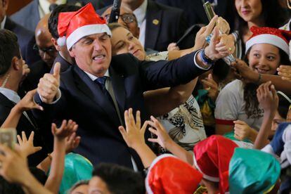 O presidente Bolsonaro participa de cerimônia de Natal no Palácio do Planalto, no dia 19.