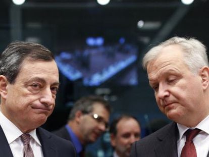 Mario Draghi e o comissário de Assuntos Monetários, Olli Rehn.