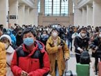 WUHAN, CHINA - JANUARY 22: People wear face masks as they wait at Hankou Railway Station on January 22, 2020 in Wuhan, China. A new infectious coronavirus known as "2019-nCoV" was discovered in Wuhan last week. Health officials stepped up efforts to contain the spread of the pneumonia-like disease which medical experts confirmed can be passed from human to human. Cases have been reported in other countries including the United States,Thailand, Japan, Taiwan, and South Korea. It is reported that Wuhan will suspend all public transportation at 10 AM on January 23, 2020.  (Photo by Xiaolu Chu/Getty Images)