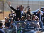 Brazil&#39;s President Jair Bolsonaro rides in an open car during an Independence Day event in Brasilia, Brazil, Monday, Sept. 7, 2020. (AP Photo/Andre Borges)