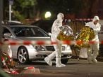 SENSITIVE MATERIAL. THIS IMAGE MAY OFFEND OR DISTURB     A body is seen in a damaged car as forensic experts work after a shooting in Hanau near Frankfurt, Germany, February 20, 2020.     REUTERS/Kai Pfaffenbach