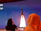 (FILES) This file photo taken on July 19, 2020, shows a screen broadcasting the launch of the "Hope" Mars probe at the Mohammed Bin Rashid Space Centre in Dubai. - The first Arab interplanetary mission is expected to reach Mars' orbit on February 9, 2021, in what is considered the most critical part of the journey to unravel the secrets of weather on the Red Planet. The unmanned probe -- named "Al-Amal" -- Arabic for "Hope" -- blasted off from Japan last year, marking the next step in the United Arab Emirates' ambitious space programme. (Photo by Giuseppe CACACE / AFP)