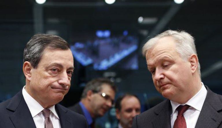 Mario Draghi e o comissário de Assuntos Monetários, Olli Rehn.