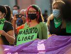 A woman holds a banner which reads "Free abort" during a protest to celebrate the decision of the Supreme Court of Justice of the Nation (SCJN) that declared the criminalization of abortion as unconstitutional, in Saltillo, Mexico September 7, 2021. REUTERS/Daniel Becerril