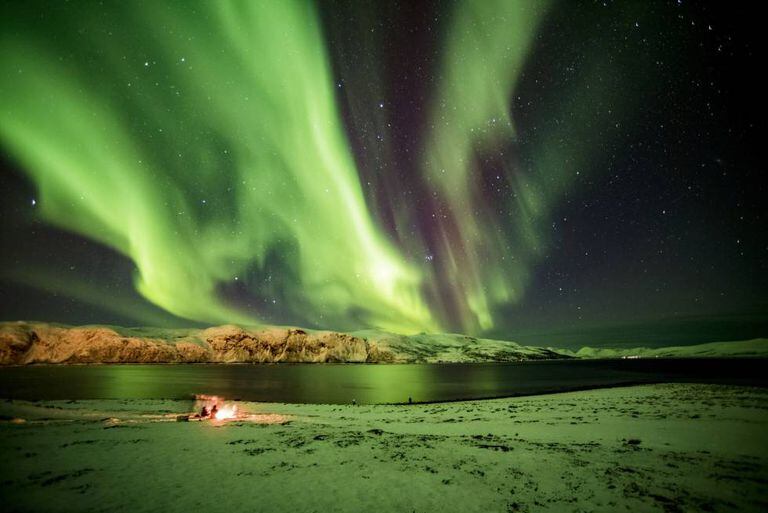 Aurora boreal em Myre, na província norueguesa de Troms, dentro do Círculo Polar Ártico.