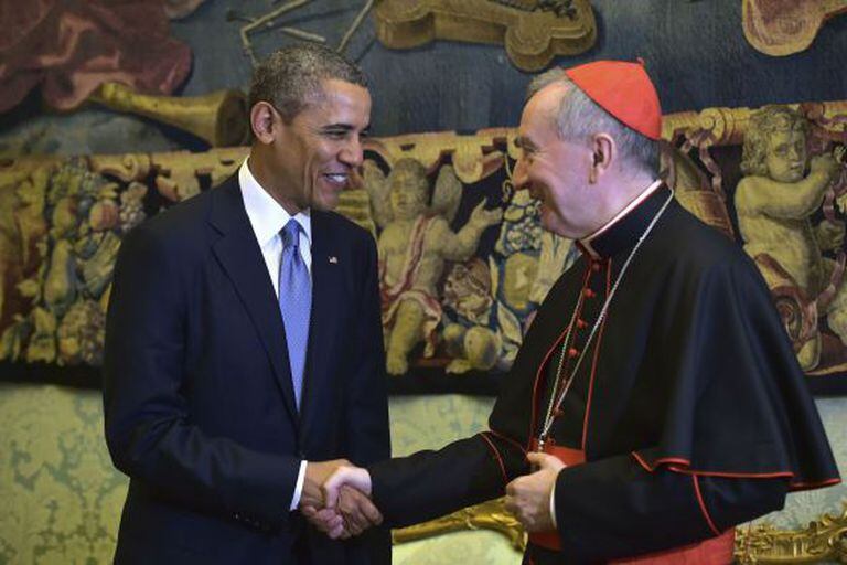 O secretário do Vaticano, Pietro Parolin, cumprimenta Obama.
