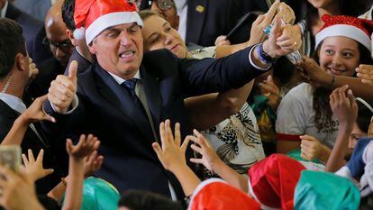 O presidente Bolsonaro participa de cerimônia de Natal no Palácio do Planalto, no dia 19.