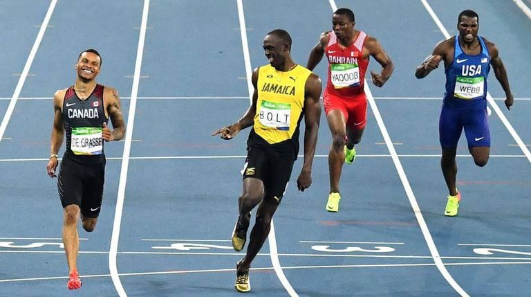 Bolt vence a De Grasse em sua série dos 200m