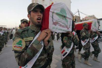 Membros da milícia xiita Asaib Ahl al-Haq em Najaf.