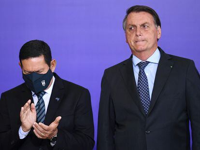 O vice-presidente Hamilton Mourão e o presidente Jair Bolsonaro, em um evento no Palácio do Planalto em 9 de novembro.