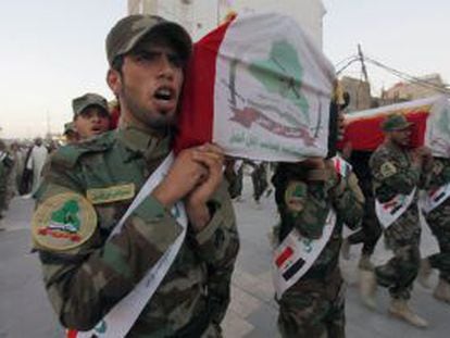 Membros da milícia xiita Asaib Ahl al-Haq em Najaf.